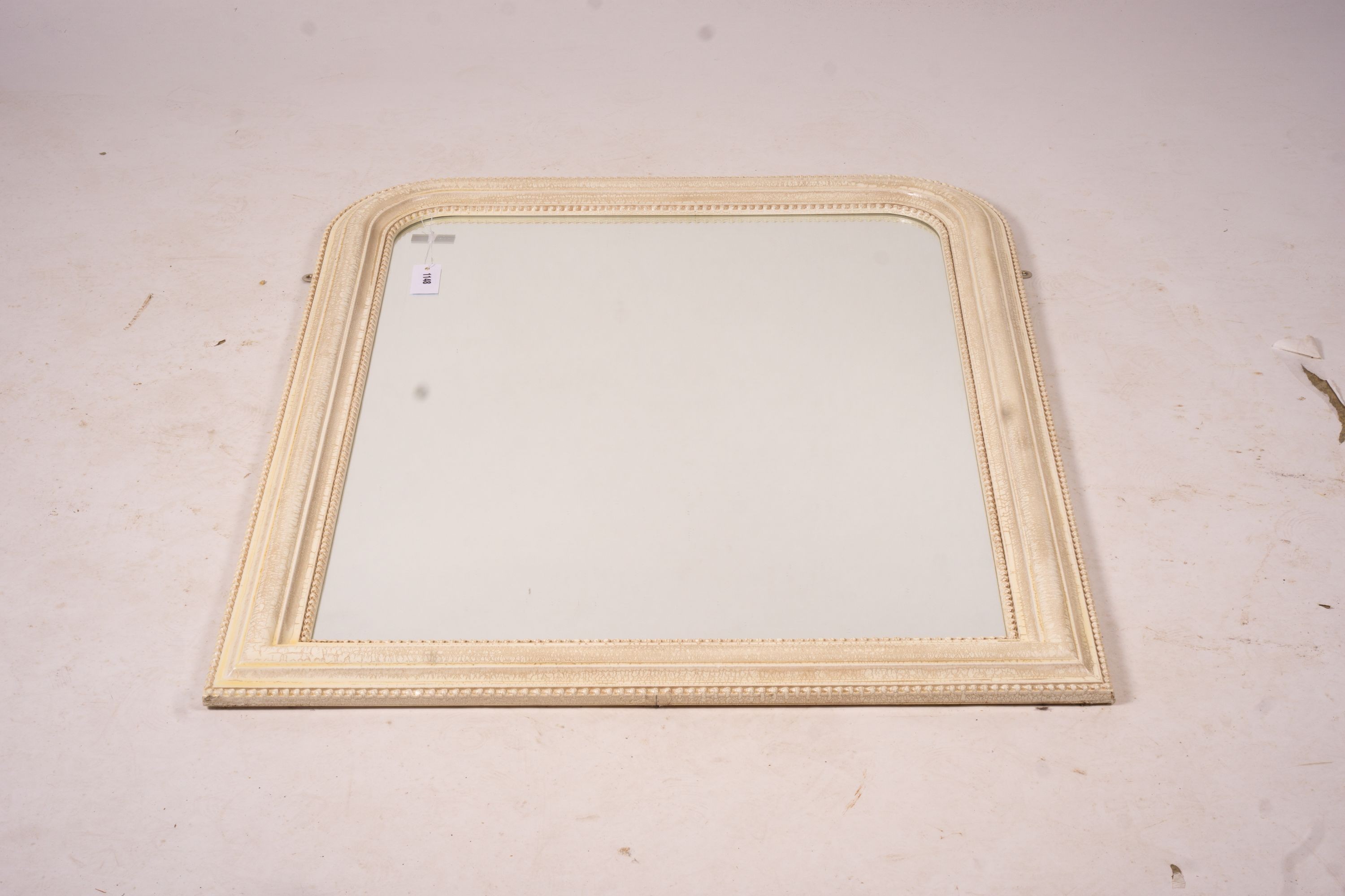 A Laura Ashley overmantel mirror, W.86cm H.110cm